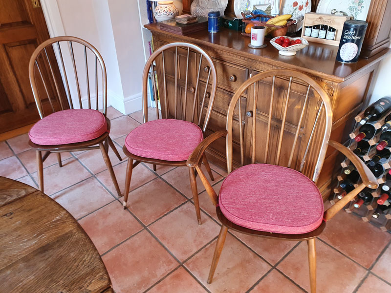 New Ercol dining chair pads, in a modern chenille fabric,  have tranformed this set of dining chairs