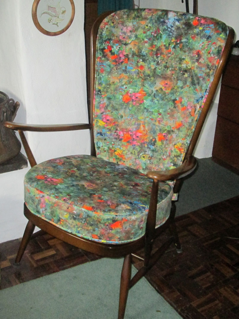 The same Ercol Chair has been transformed with new cushions